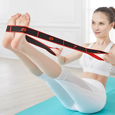 élastiques musculation numerotes assise sur tapis etirement avec ses pieds