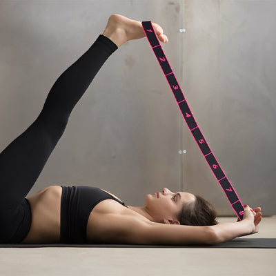 etendue sur le dos une jambe levee etire élastiques musculation  