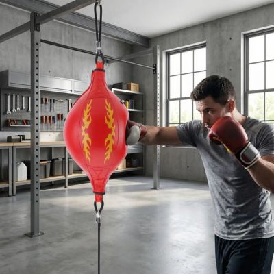Homme boxe punching ball rouge accroché double extrémité à support 