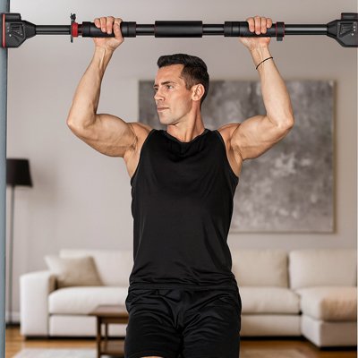 homme dos au canape barre de traction pote