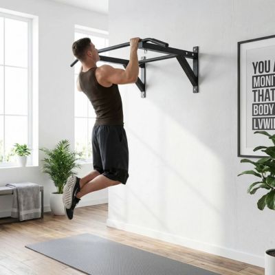 jeune homme salon etirement dos avec barre de traction exterieur