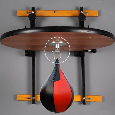 poire de boxe fixé au support sac de frappe